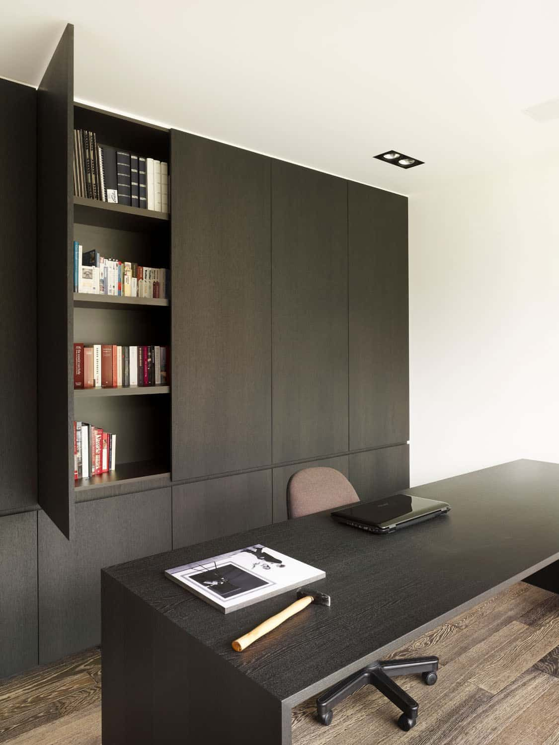 Dark wood cabinetry with a smooth refinished surface